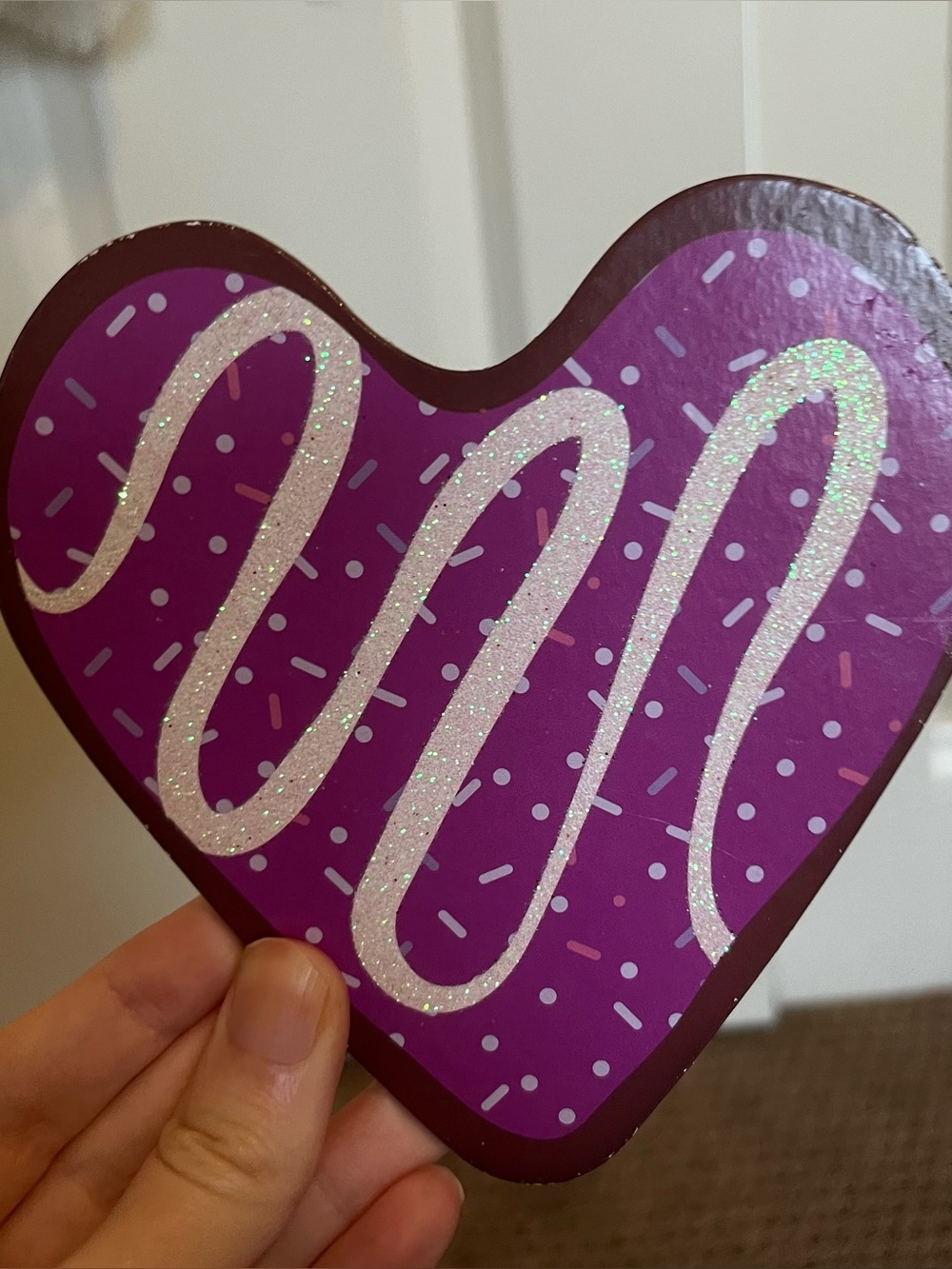 Sparkly heart dessert decoration